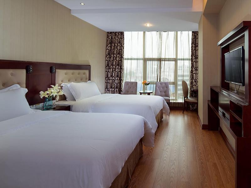 Vienna Hotel In Pinghu Square Shenzhen Extérieur photo